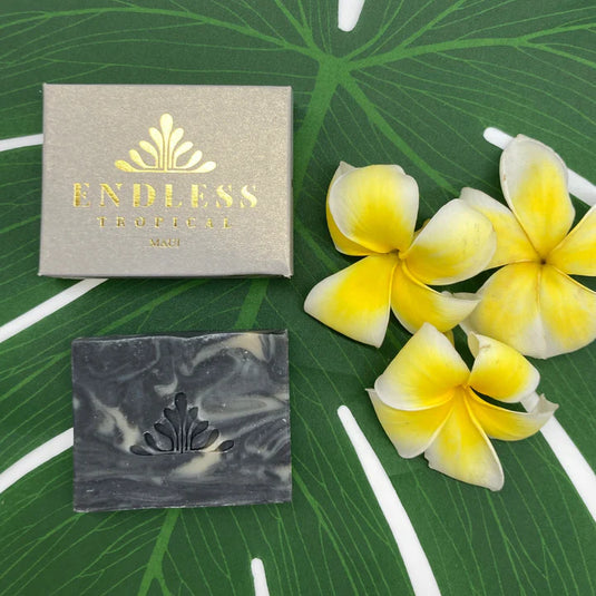 luxury spa basket featuring items from hawaii women small businesses, puna noni shampoo and conditioner, endless tropical maui soap, kudu made headbands, tradition coffee roasters scrub, shop small hawaii pamper yourself spa basket