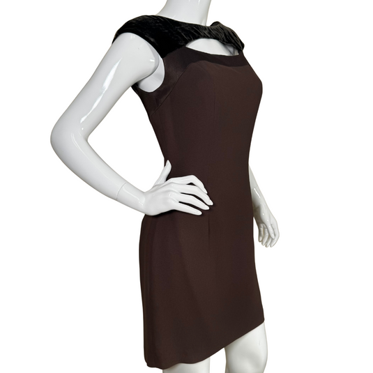 pre-loved Andrea Polizzi for Rex Lester Brown Mini Dress with Suede Neckline understated glamour with a contemporary edge. Crafted with clean lines and a form-flattering silhouette, the dress features a unique black suede neckline that adds texture and a touch of luxury.