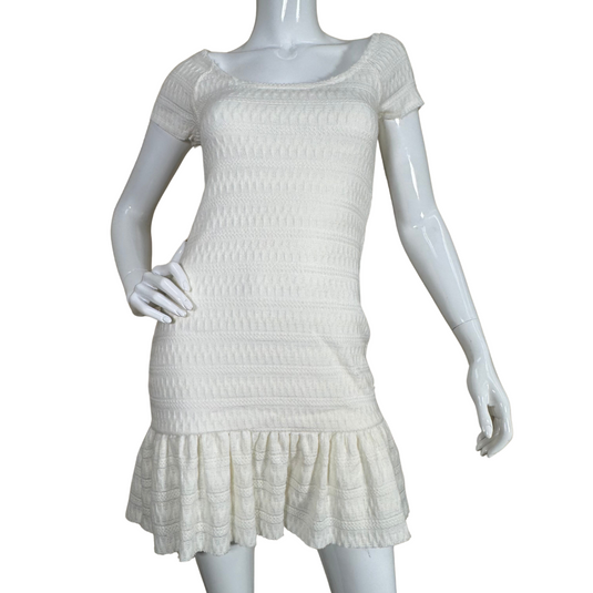 Chic and charming, this Free People Chick and Charming Knit Cream Dress boasts a textured