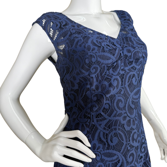 elegant Lilly Pultizer Royal Blue Lace Dress features a rich navy blue color with an intricate lace overlay that adds texture and sophistication