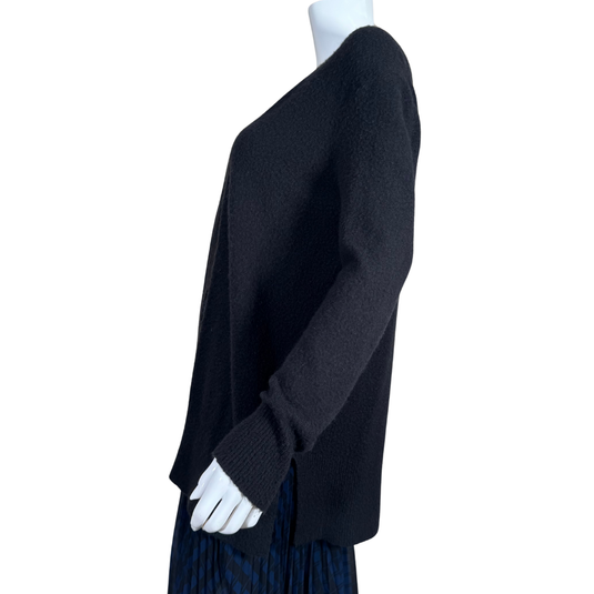 Madewell Opened Classic Black Knit Cardigan. Crafted from a soft, textured fabric, it boasts a flattering open-front design that makes layering effortless