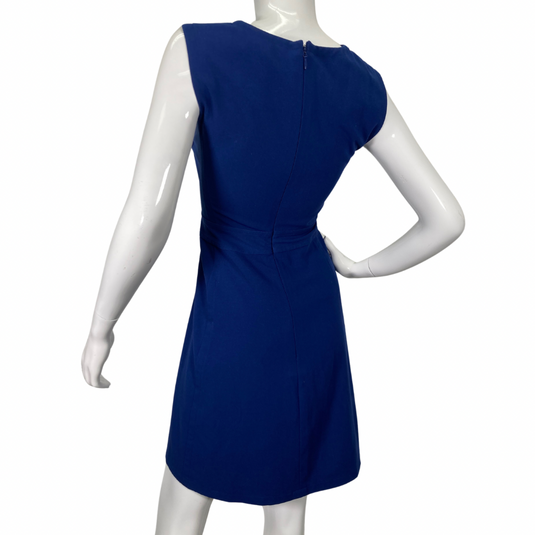 BCBG Maxazria Royal Blue Dress is a classic and elegant sleeveless dress in a vibrant royal blue color - backside view