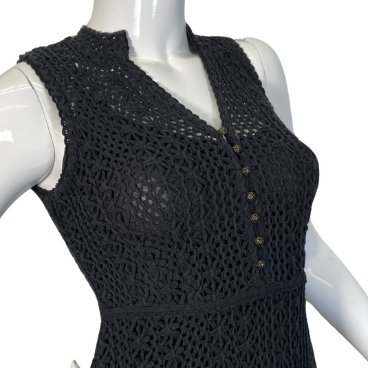This Meadow Rue by Anthropologie Black Lace Knit Dress is a sleeveless, knee-length piece with a fitted silhouette - close up view