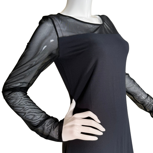 chic Tommy Bahama Black Dress with Sheer Sleeves features sheer long sleeves and a semi-sheer neckline that adds a touch of sophistication and allure