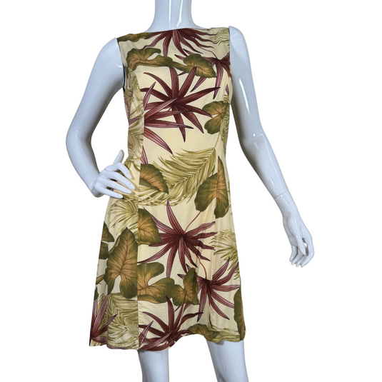 pre-loved Tori Richard Cream Dress Featuring Tropical Motives features a vibrant tropical leaf print in shades of green and deep red on a soft beige background