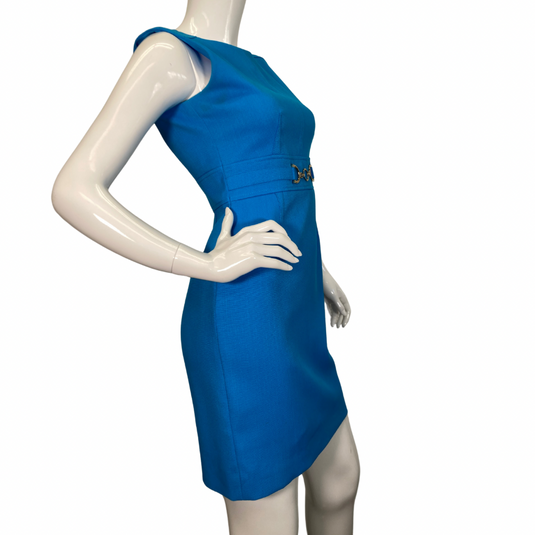 Tahari Seath Vibrant Blue Dress is a chic, sleeveless sheath dress in a vibrant shade of blue side view