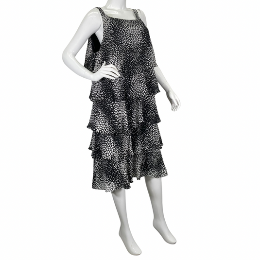S.L. Fashions charming and playful black and white ruffle dress side view