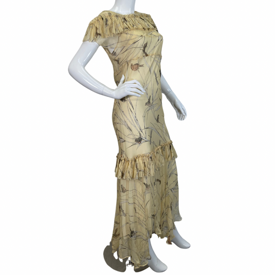 Marni Yellow Maxi Dress with Birds is a delicate, vintage-style evening dress with a soft cream base color and a nature-inspired print featuring birds and reeds side view