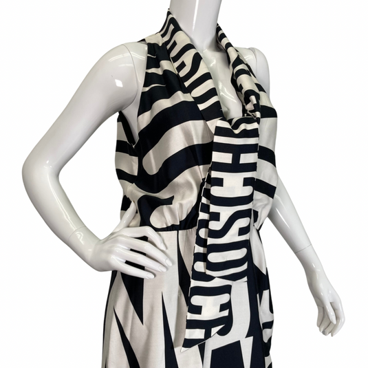 Moschino Couture Black and White Monogram Dress is a bold, statement piece with a monochromatic black-and-white color scheme close-up view