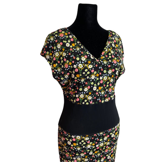 Tory Burch Black Floral Dress on mannequin front close up view