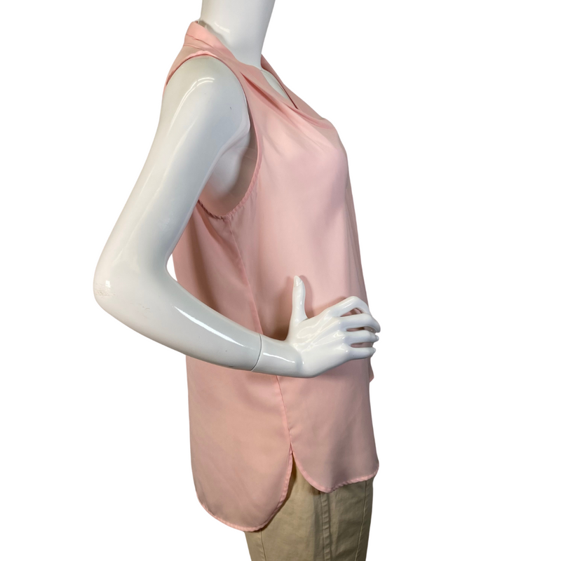 Load image into Gallery viewer, Vince Camuto Light Pink Sheer Sleeveless Blouse in a soft pastel pink color features a draped V-neckline with a relaxed, flowy fit - side view
