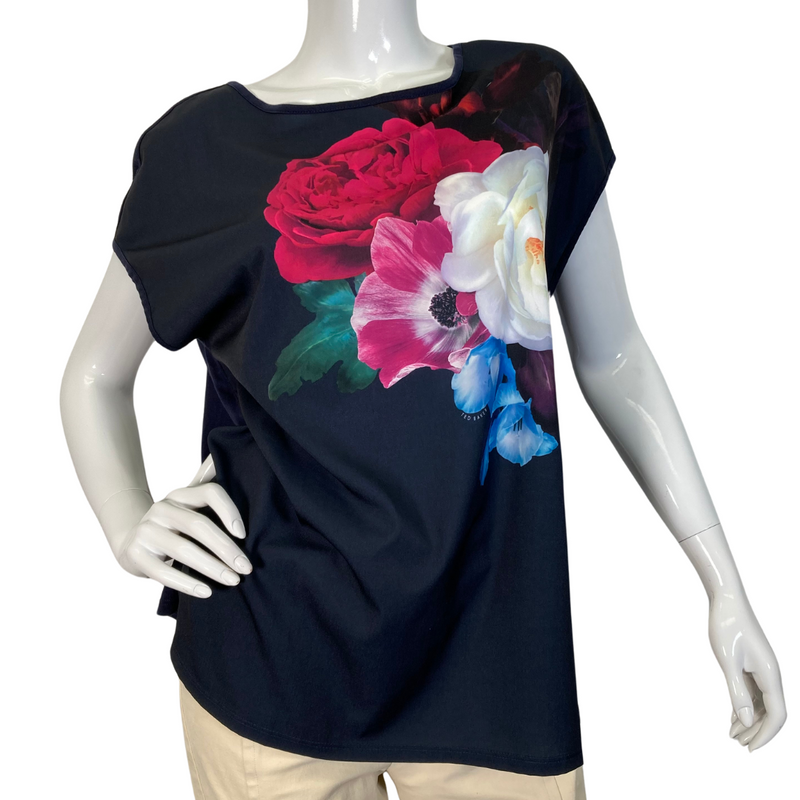 Load image into Gallery viewer, Ted Baker Rose Floral Black Top is a women’s short-sleeve black top featuring a bold and vibrant floral print - front view
