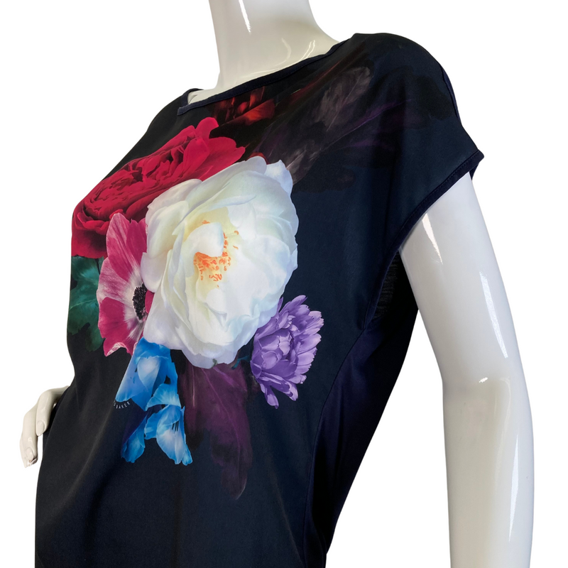 Load image into Gallery viewer, Ted Baker Rose Floral Black Top is a women’s short-sleeve black top featuring a bold and vibrant floral print - close-up view
