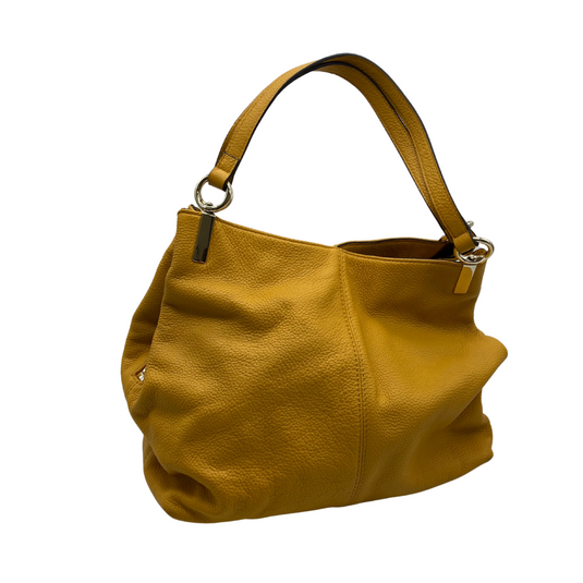 Vince Camuto Yellow Leather Hobo Bag is featuring a soft, pebbled leather texture and a relaxed, slouchy silhouette - backside view