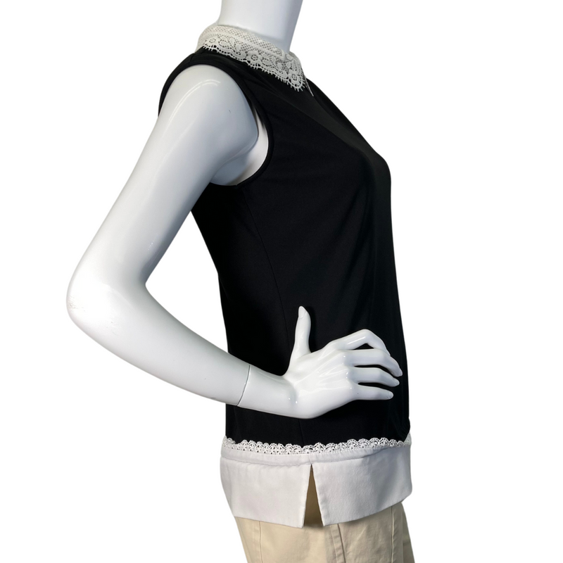 Load image into Gallery viewer, Karl Lagerfeld Black Blouse with Lace Neckline features a sleeveless black top with elegant white lace detailing - side view
