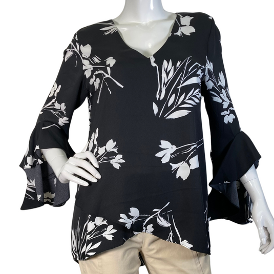 Vince Camuto Black Blouse White Florals features a stylish black blouse with a white floral print design - front view