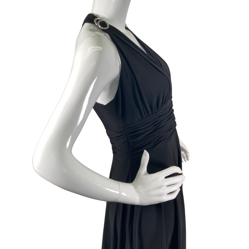 Load image into Gallery viewer, Evan Picone Black Dress with Elastic Waist is a knee-length halter dress, featuring a plunging V-neckline and ruched detailing along the bodice for a flattering fit - side view close-up
