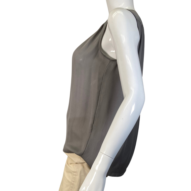 Load image into Gallery viewer, Vince Light Grey Blouse is a sleek, sleeveless gray blouse with a V-neckline and subtle pleating at the shoulders for added elegance - side view
