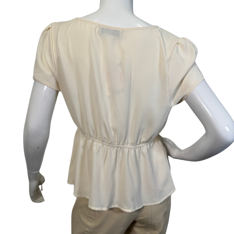 Load image into Gallery viewer, Eden In Love Elegant Cream Blouse is a minimalist design in a solid cream or off-white color - backside view
