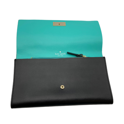 Kate Spade Sleek Black Clutch with Turquoise Blue Interior features a sleek black exterior with a gold-tone metal logo plate on the front