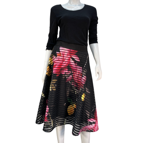 Ted Baker dark floral skirt, pink colors and lemons on designer skirt, thrifted clothing, designer deals. knee-length skirt on mannequin, ted baker designer, elegant and classy, timeless skirt piece. shop local, shop small.