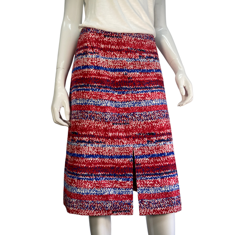 Load image into Gallery viewer, The unique print of this mid-length Tory Burch skirt sets it apart as a statement-making choice to pair with any neutral top. Brand: Tory Burch Tag size: 6. Patriotic coloring, 4th of July skirt, america print, donated clothing, thrifting, end fast fashion. Shop small, shop local.
