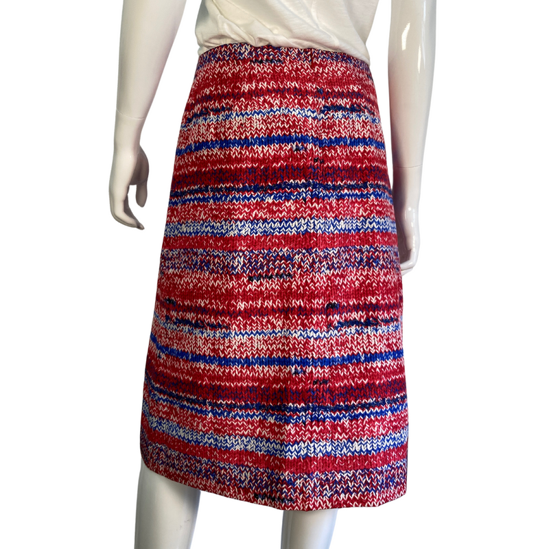 Load image into Gallery viewer, The unique print of this mid-length Tory Burch skirt sets it apart as a statement-making choice to pair with any neutral top. Brand: Tory Burch Tag size: 6. Patriotic coloring, 4th of July skirt, america print, donated clothing, thrifting, end fast fashion. Shop small, shop local.
