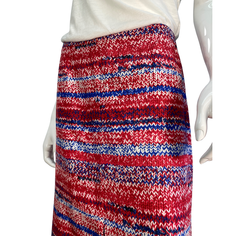 Load image into Gallery viewer, The unique print of this mid-length Tory Burch skirt sets it apart as a statement-making choice to pair with any neutral top. Brand: Tory Burch Tag size: 6. Patriotic coloring, 4th of July skirt, america print, donated clothing, thrifting, end fast fashion. Shop small, shop local.
