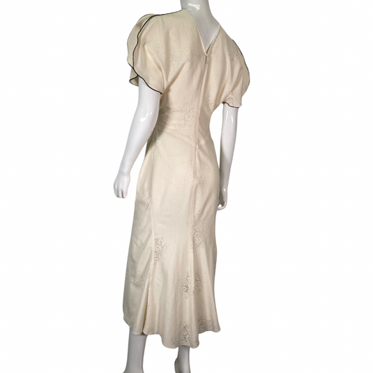 Victoria Backham Elegant Cream-Colored Dress on mannequin back view