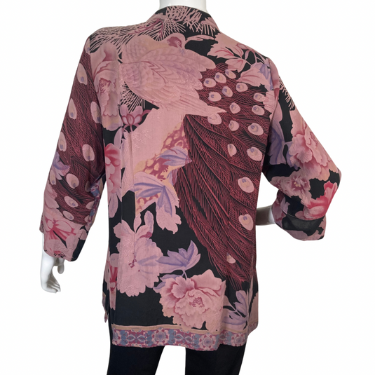 Citron Stylish Purple Flowers Blouse features a floral pattern in shades of pink, purple, and black - backside view