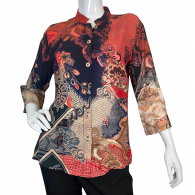 Citron Electric Blouse with Mix of Patterns and Colors showcases a patchwork of intricate designs, including floral, geometric, and traditional Asian motifs - front view