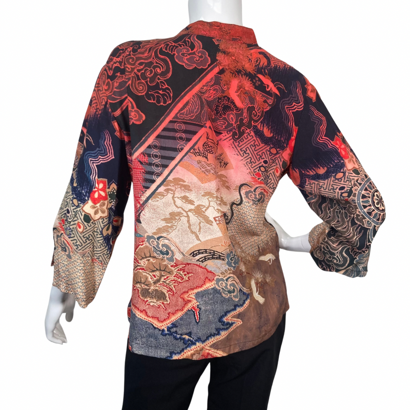 Load image into Gallery viewer, Citron Electric Blouse with Mix of Patterns and Colors showcases a patchwork of intricate designs, including floral, geometric, and traditional Asian motifs backside view
