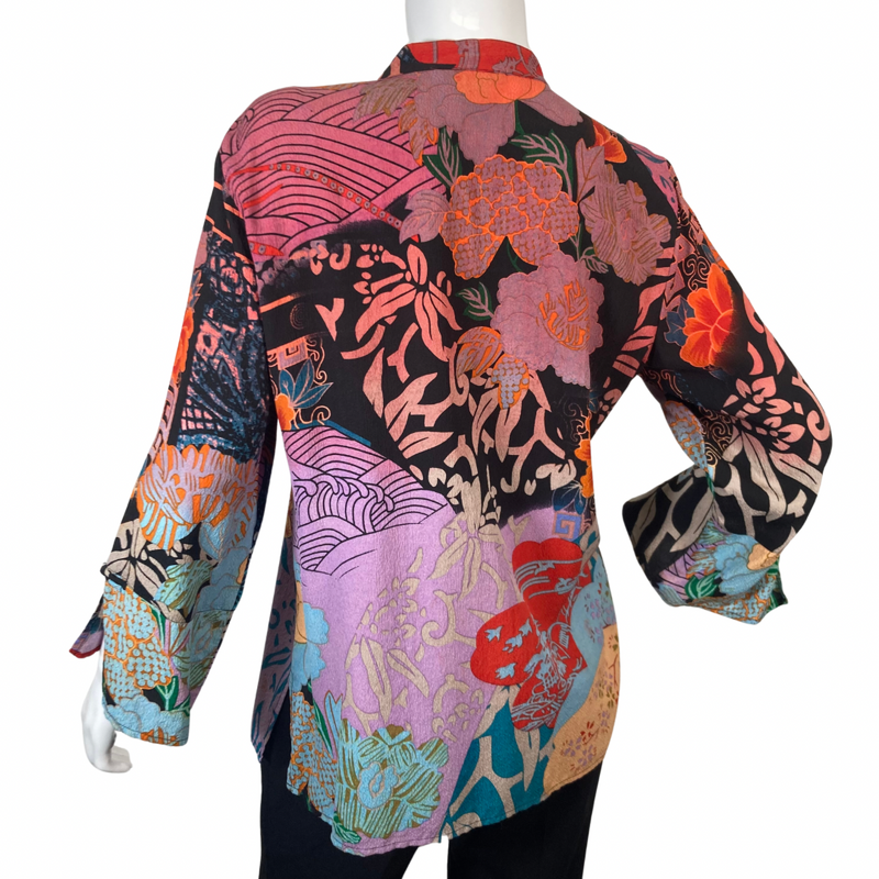 Load image into Gallery viewer, Citron Vibrant Pink and Purple Collage Blouse has a bold, artistic design with a mix of colors - backside view
