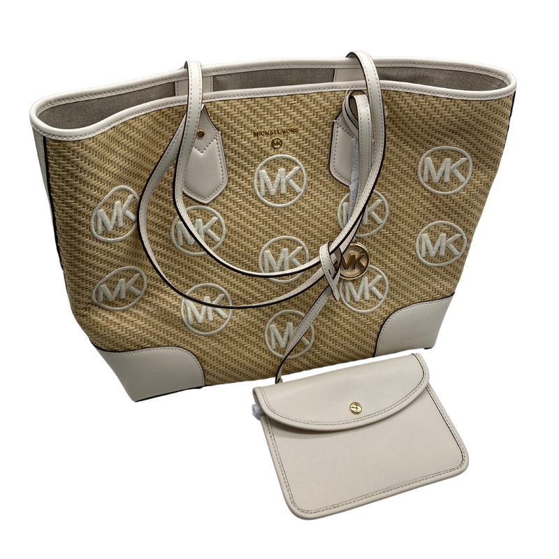 Load image into Gallery viewer, Michael Kors Woven Cream Tote Bag is a designer tote bag. It features a beige woven straw texture with cream-colored leather accents along the edges and handles - front view
