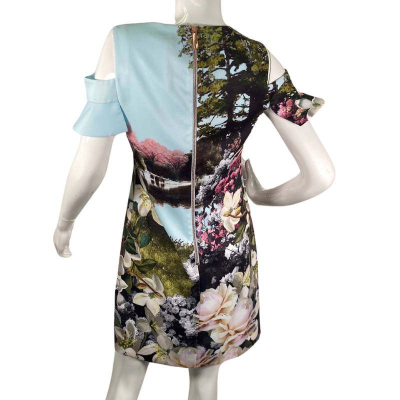 Load image into Gallery viewer, Ted Baker Dress in Light Blue with Lakescape and Floral Garden&nbsp;is a stylish short-sleeve dress featuring a vibrant nature-inspired print - backside view
