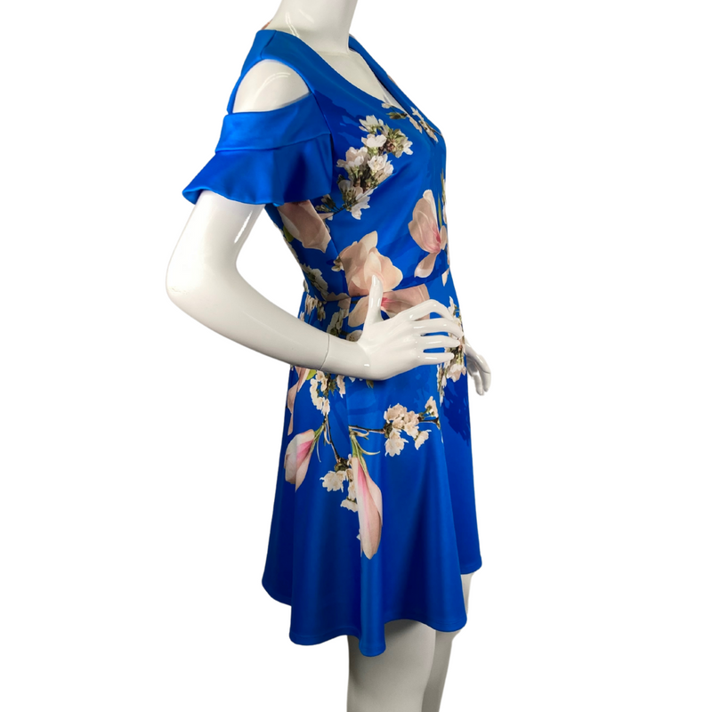 Load image into Gallery viewer, charming pre-loved Ted Baker Rich Blue Dress in White Delicate Florals, featuring large magnolia blossoms and delicate white flowers - side view
