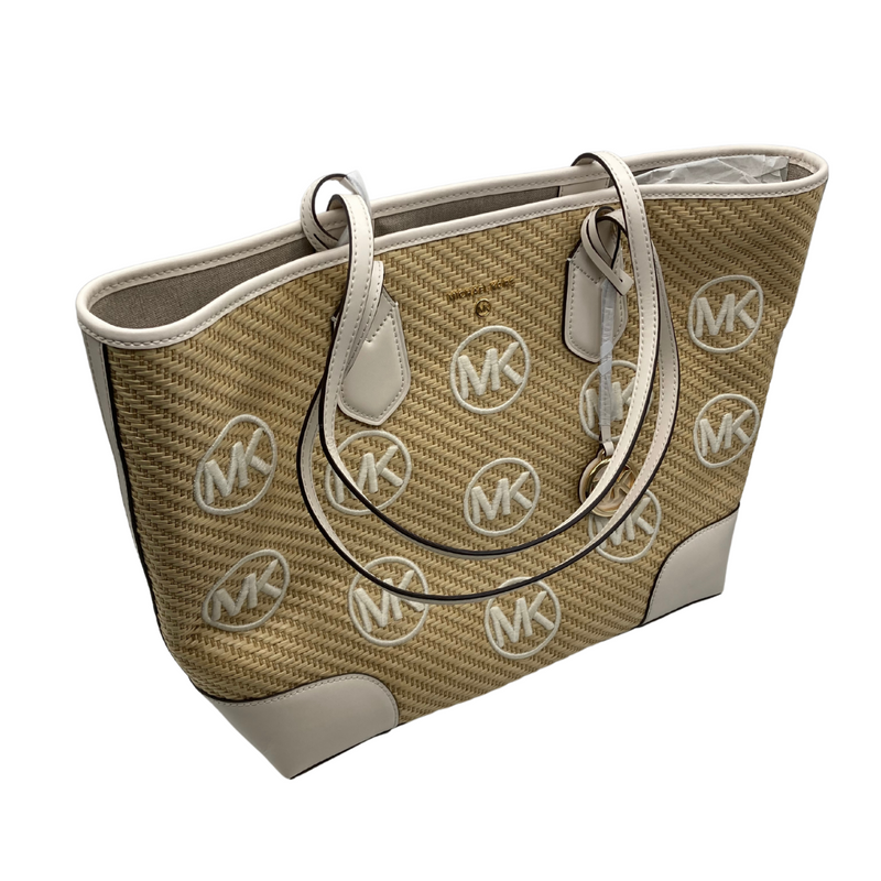 Load image into Gallery viewer, Michael Kors Woven Cream Tote Bag is a designer tote bag. It features a beige woven straw texture with cream-colored leather accents along the edges and handles
