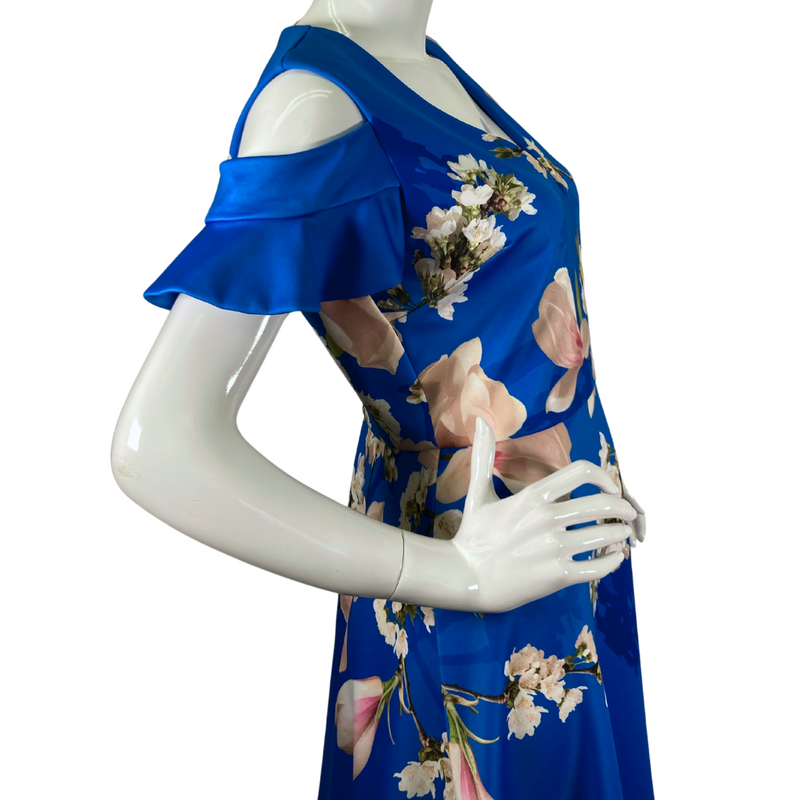 Load image into Gallery viewer, charming pre-loved Ted Baker Rich Blue Dress in White Delicate Florals, a featuring large magnolia blossoms and delicate white flowers - side view close-up
