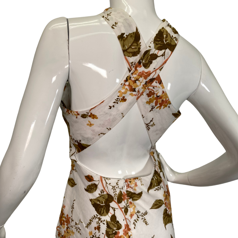 Load image into Gallery viewer,  preloved Reformation Floral Linen Maxi Dress is an elegant, sleeveless, high-neck, maxi dress with a beautiful floral print - backside view close up
