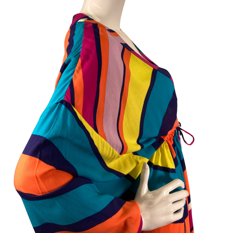 Load image into Gallery viewer, Trina Turk Bright Colorful Cover-Up is a colorful, bohemian-style mini dress featuring a bold, multi-colored stripe pattern in shades of orange, blue, pink, yellow, and purple - close-up
