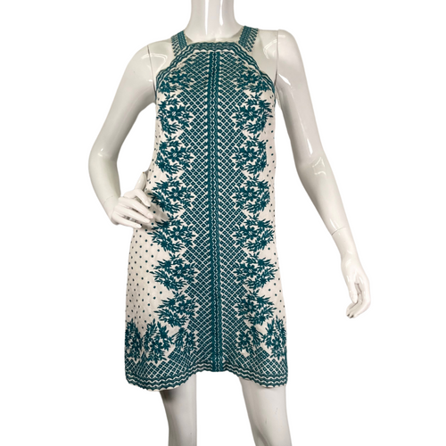 Maeve by Anthropologie White Linen Dress with Turquoise Embroidery is a sleeveless, halter-style mini dress with a vintage-inspired design - front view