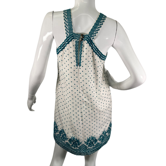 Maeve by Anthropologie White Linen Dress with Turquoise Embroidery is a sleeveless, halter-style mini dress with a vintage-inspired design - backside view