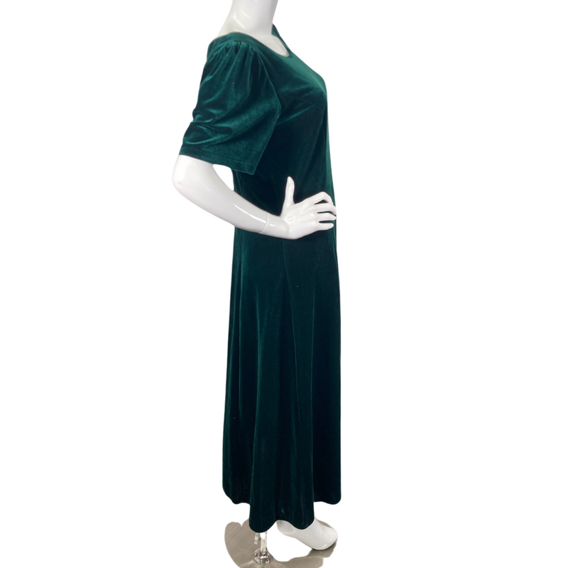 Load image into Gallery viewer, T &amp; L Muumuu Factory Green Velvet Dress is a sophisticated midi dress made from luxurious emerald green velvet - side view
