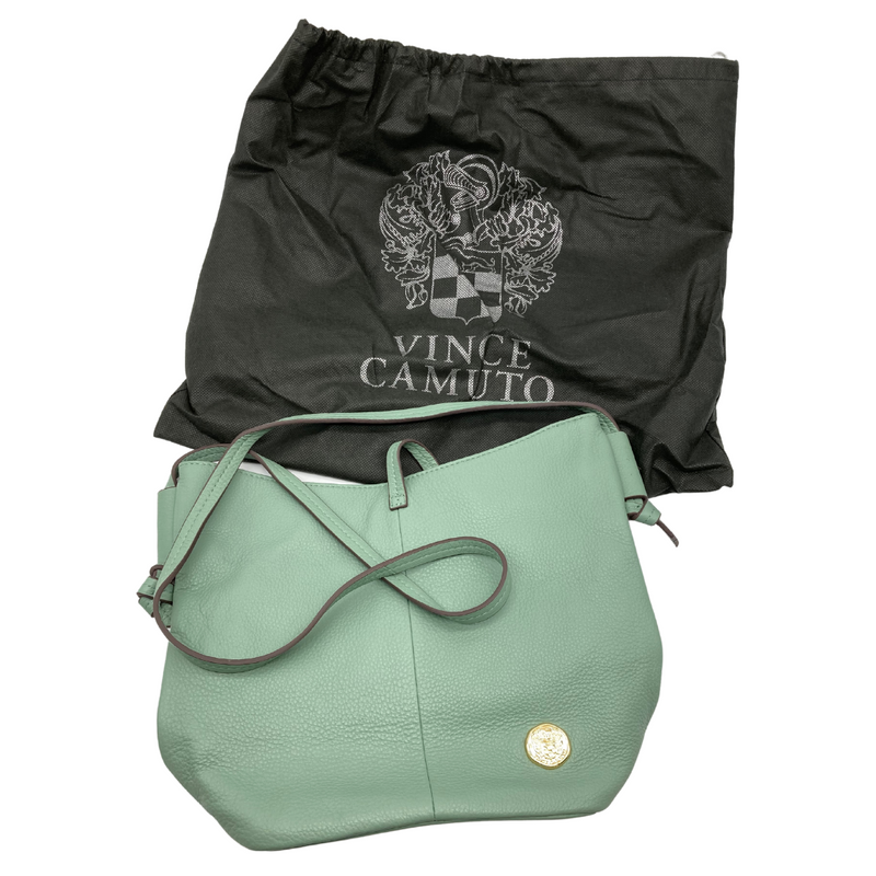 Load image into Gallery viewer, Vince Camuto Seafoam Green Shoulder Bag is a stylish, soft sage green leather handbag with a minimalist design. It features an adjustable shoulder strap, making it perfect for crossbody or shoulder wear. 
