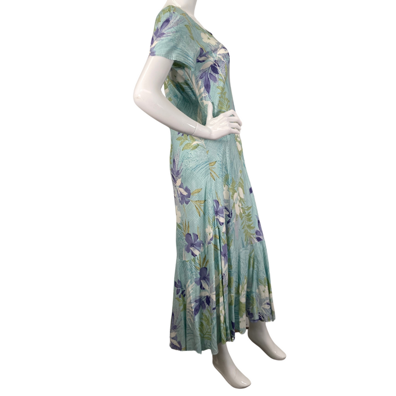 Load image into Gallery viewer, Nani Hawaii Light Blue Botanical Dress is a long, flowing style with short sleeves and a scoop neckline- side view
