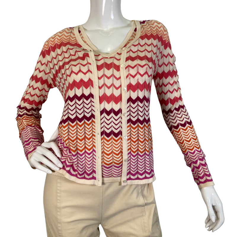 Load image into Gallery viewer, Neiman Marcus Exclusive Silk Tank Top and Sweater is a lightweight women’s cardigan featuring a vibrant zigzag pattern in shades of red, orange, and cream - front view
