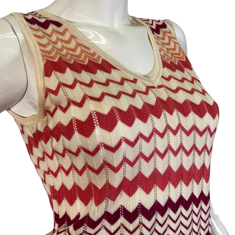 Load image into Gallery viewer, Neiman Marcus Exclusive Silk Tank Top and Sweater is a lightweight women’s cardigan featuring a vibrant zigzag pattern in shades of red, orange, and cream - vest only side view close-up
