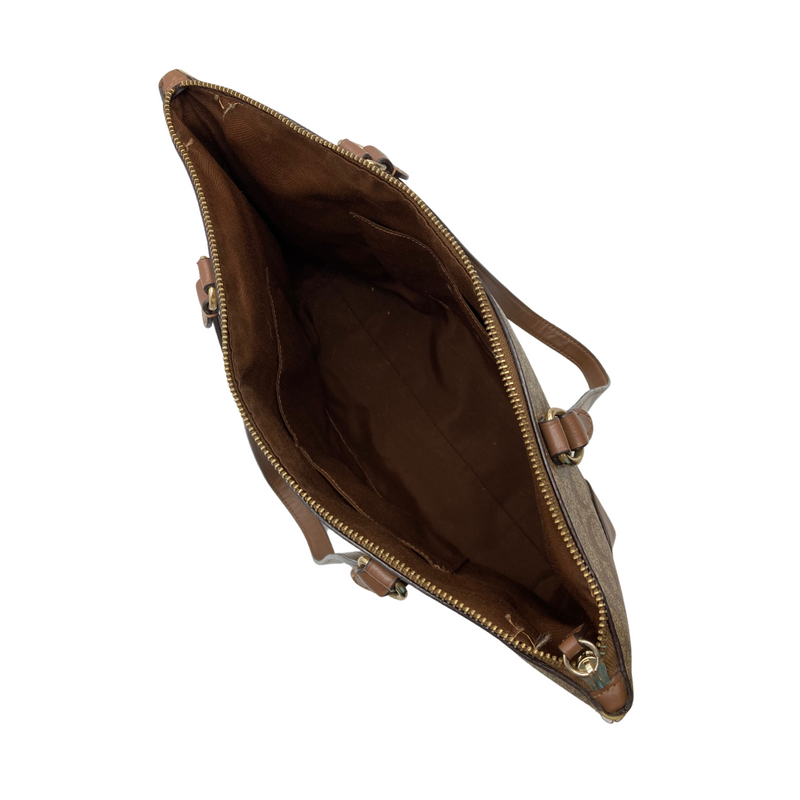 Load image into Gallery viewer, Coach Signature Tote Bag, featuring the brand’s iconic “C” monogram pattern in a beige and brown colorway - top view
