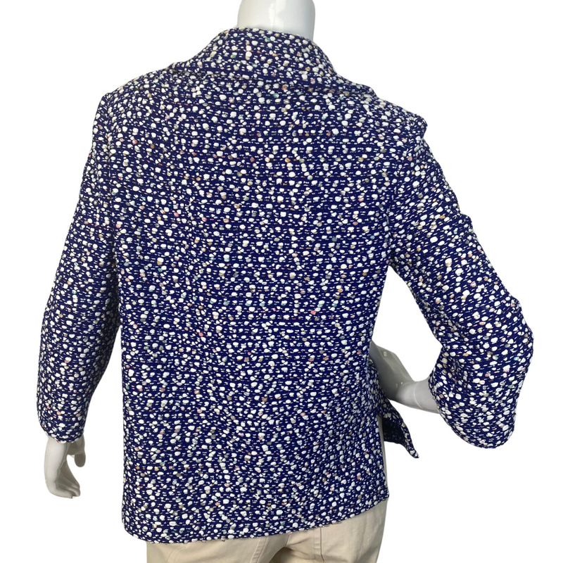 Load image into Gallery viewer, St. John Warm Playful Blue and White Coat Jacket is a women’s button-up blouse with a multi-colored polka-dot like pattern on a dark background - backside view
