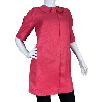 Ann Taylor Bright Pink Short Sleeve Linen Blazer offers a playful yet sophisticated twist on outerwear. With a slight A-line silhouette and a hidden placket for a clean, modern look